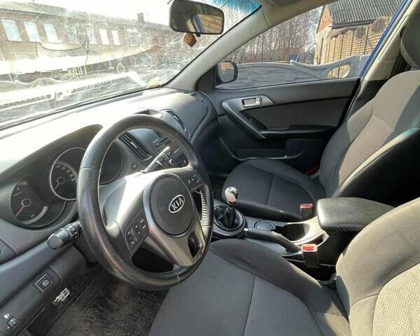 Синій Кіа Черато, об'ємом двигуна 2 л та пробігом 133 тис. км за 7200 $, фото 6 на Automoto.ua