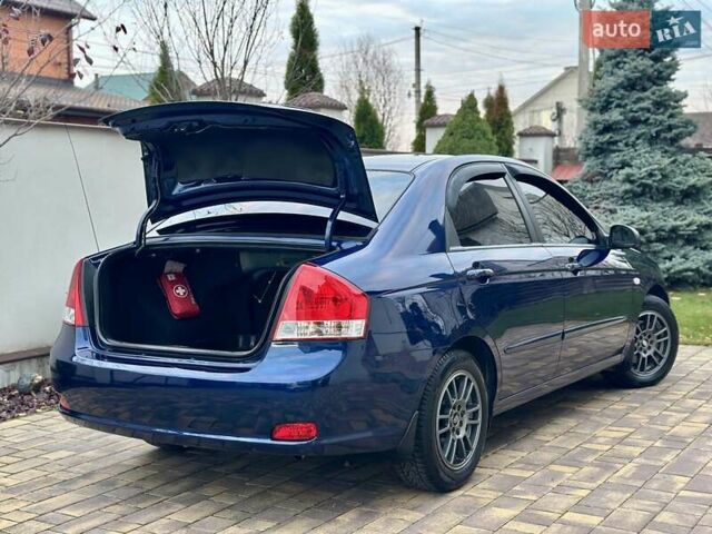 Синий Киа Черато, объемом двигателя 1.6 л и пробегом 125 тыс. км за 5750 $, фото 23 на Automoto.ua