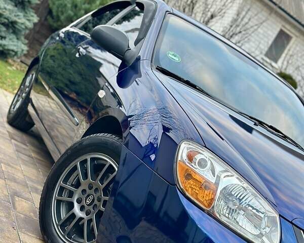 Синий Киа Черато, объемом двигателя 1.6 л и пробегом 125 тыс. км за 5750 $, фото 11 на Automoto.ua