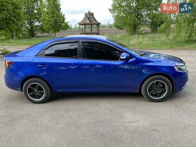Синій Кіа Черато, об'ємом двигуна 2 л та пробігом 230 тис. км за 7350 $, фото 1 на Automoto.ua