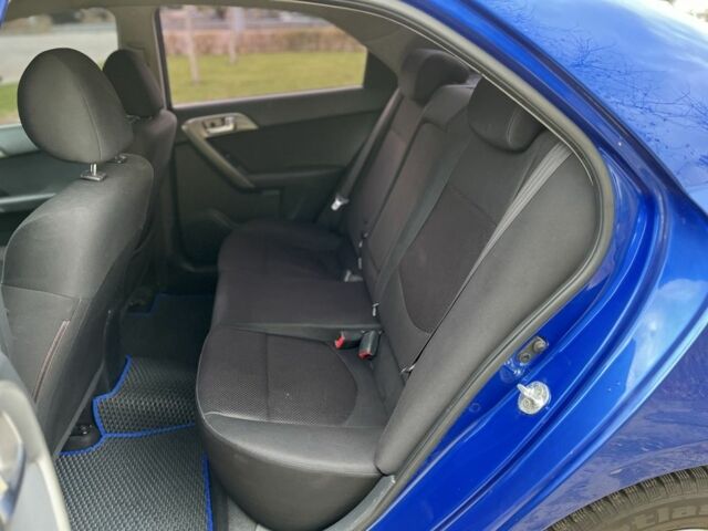 Синій Кіа Черато, об'ємом двигуна 1.6 л та пробігом 238 тис. км за 6500 $, фото 4 на Automoto.ua