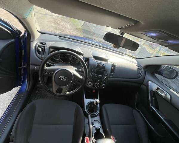 Синій Кіа Черато, об'ємом двигуна 2 л та пробігом 133 тис. км за 7200 $, фото 22 на Automoto.ua