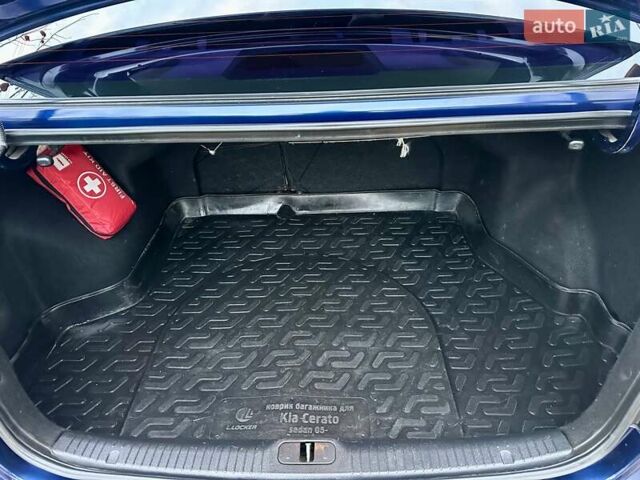Синий Киа Черато, объемом двигателя 1.6 л и пробегом 125 тыс. км за 5750 $, фото 24 на Automoto.ua