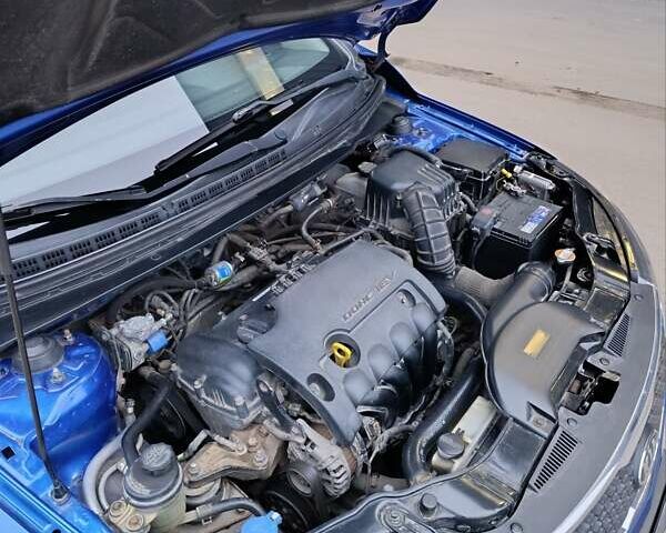 Синій Кіа Черато, об'ємом двигуна 1.59 л та пробігом 220 тис. км за 9500 $, фото 7 на Automoto.ua
