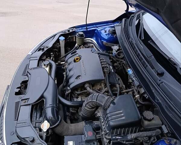 Синій Кіа Черато, об'ємом двигуна 1.59 л та пробігом 220 тис. км за 9500 $, фото 8 на Automoto.ua