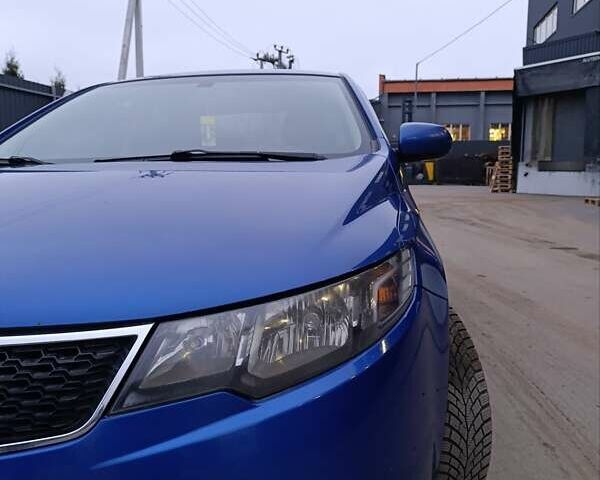 Синій Кіа Черато, об'ємом двигуна 1.59 л та пробігом 220 тис. км за 9500 $, фото 4 на Automoto.ua