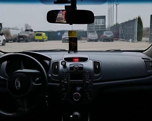 Синій Кіа Черато, об'ємом двигуна 1.59 л та пробігом 220 тис. км за 9500 $, фото 14 на Automoto.ua