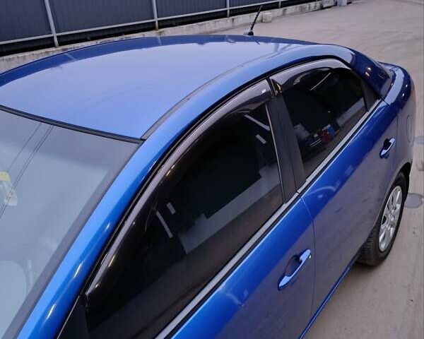Синій Кіа Черато, об'ємом двигуна 1.59 л та пробігом 220 тис. км за 9500 $, фото 3 на Automoto.ua