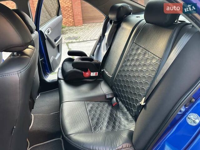 Синий Киа Черато, объемом двигателя 1.59 л и пробегом 140 тыс. км за 9200 $, фото 43 на Automoto.ua