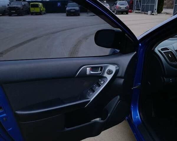 Синій Кіа Черато, об'ємом двигуна 1.59 л та пробігом 220 тис. км за 9500 $, фото 16 на Automoto.ua