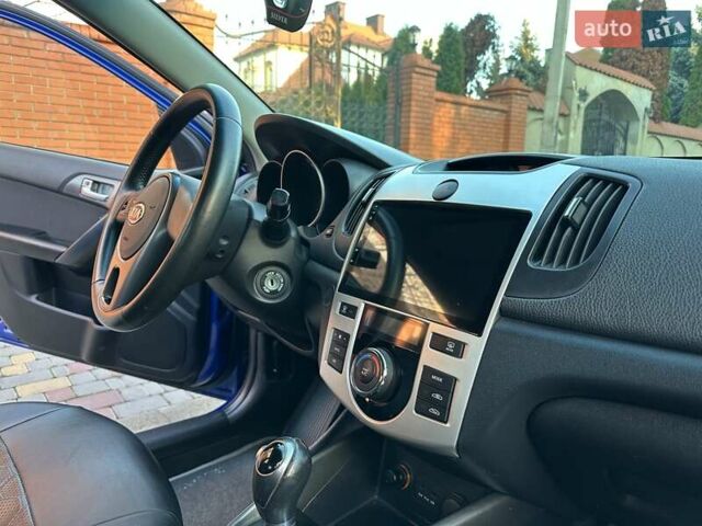 Синий Киа Черато, объемом двигателя 1.59 л и пробегом 140 тыс. км за 9200 $, фото 47 на Automoto.ua