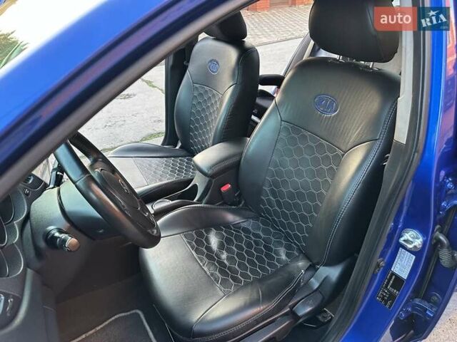 Синий Киа Черато, объемом двигателя 1.59 л и пробегом 140 тыс. км за 9200 $, фото 39 на Automoto.ua