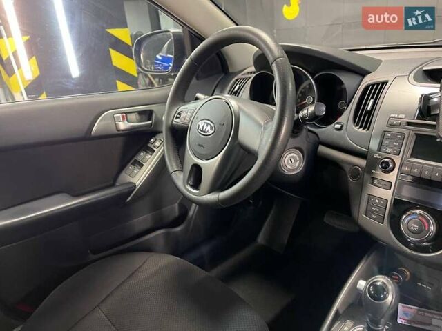 Синий Киа Черато, объемом двигателя 1.6 л и пробегом 160 тыс. км за 8300 $, фото 32 на Automoto.ua