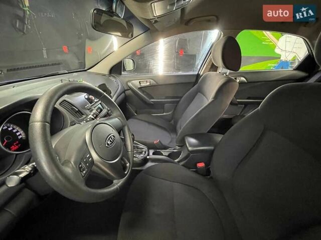 Синий Киа Черато, объемом двигателя 1.6 л и пробегом 160 тыс. км за 8300 $, фото 26 на Automoto.ua