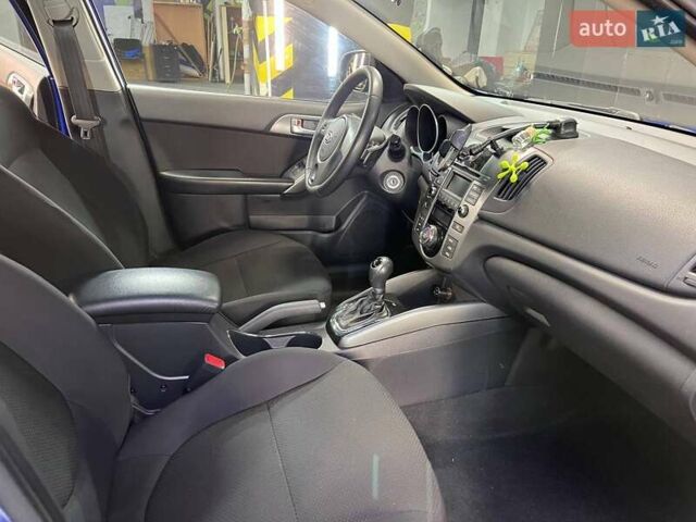 Синий Киа Черато, объемом двигателя 1.6 л и пробегом 160 тыс. км за 8300 $, фото 33 на Automoto.ua