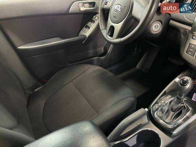 Синий Киа Черато, объемом двигателя 1.6 л и пробегом 160 тыс. км за 8300 $, фото 31 на Automoto.ua