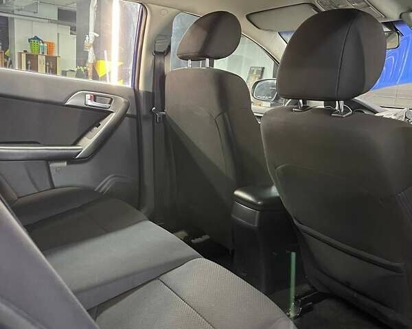 Синий Киа Черато, объемом двигателя 1.6 л и пробегом 160 тыс. км за 8300 $, фото 29 на Automoto.ua