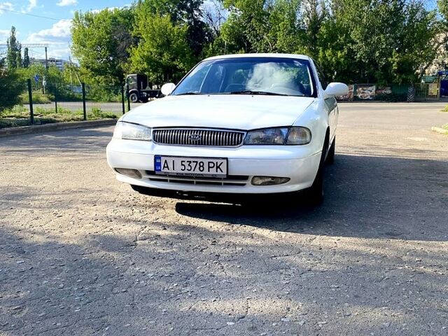 Белый Киа Кларус, объемом двигателя 2 л и пробегом 200 тыс. км за 1850 $, фото 10 на Automoto.ua
