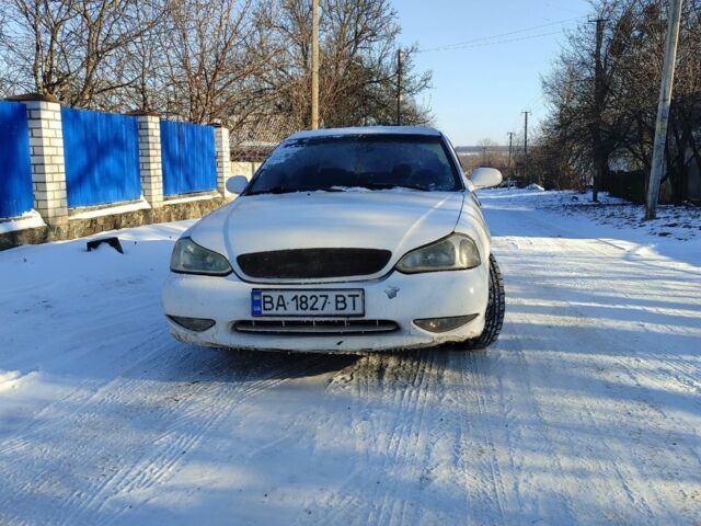 Белый Киа Кларус, объемом двигателя 1.8 л и пробегом 300 тыс. км за 1700 $, фото 3 на Automoto.ua