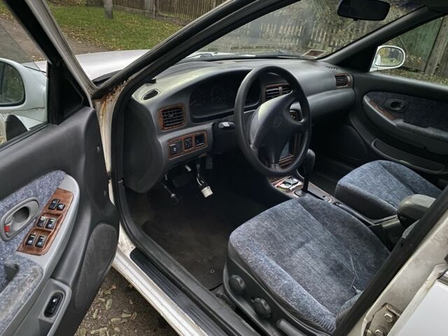 Білий Кіа Кларус, об'ємом двигуна 0 л та пробігом 200 тис. км за 885 $, фото 6 на Automoto.ua