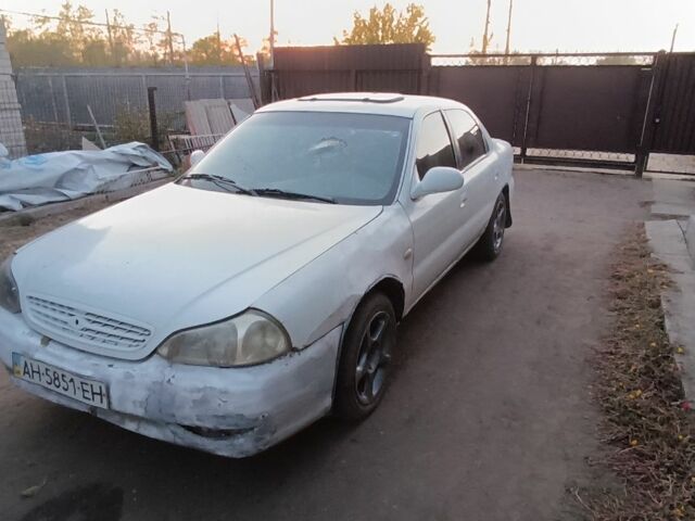 Белый Киа Кларус, объемом двигателя 2 л и пробегом 260 тыс. км за 453 $, фото 6 на Automoto.ua