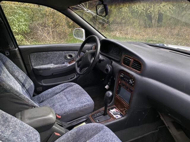 Білий Кіа Кларус, об'ємом двигуна 0 л та пробігом 200 тис. км за 885 $, фото 4 на Automoto.ua