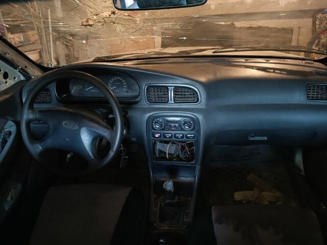 Белый Киа Кларус, объемом двигателя 2 л и пробегом 260 тыс. км за 453 $, фото 4 на Automoto.ua