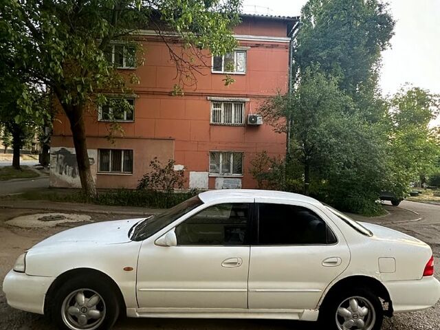 Белый Киа Кларус, объемом двигателя 2 л и пробегом 110 тыс. км за 1500 $, фото 3 на Automoto.ua