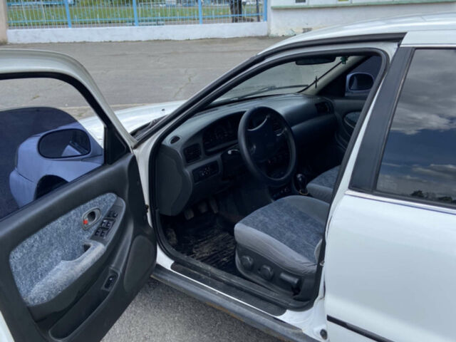 Білий Кіа Кларус, об'ємом двигуна 2 л та пробігом 270 тис. км за 1000 $, фото 8 на Automoto.ua