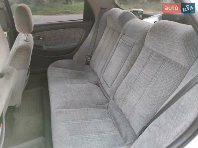 Белый Киа Кларус, объемом двигателя 2 л и пробегом 338 тыс. км за 1900 $, фото 8 на Automoto.ua
