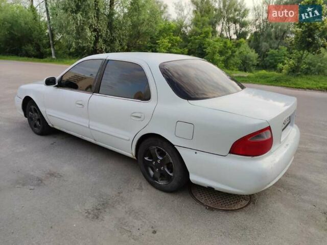 Белый Киа Кларус, объемом двигателя 2 л и пробегом 338 тыс. км за 1900 $, фото 7 на Automoto.ua