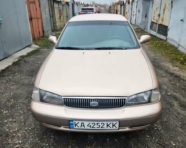 Бежевый Киа Кларус, объемом двигателя 2 л и пробегом 292 тыс. км за 2200 $, фото 1 на Automoto.ua