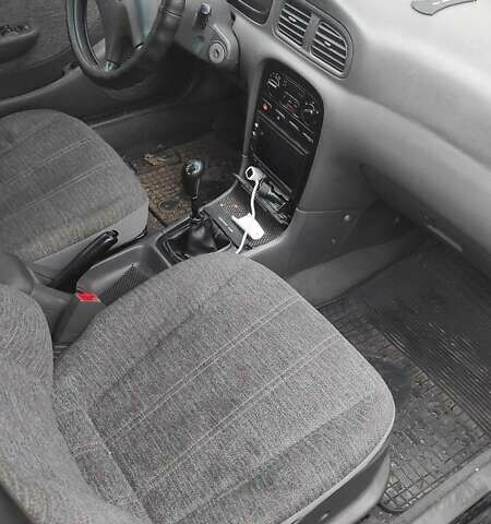 Бежевый Киа Кларус, объемом двигателя 2 л и пробегом 335 тыс. км за 800 $, фото 8 на Automoto.ua