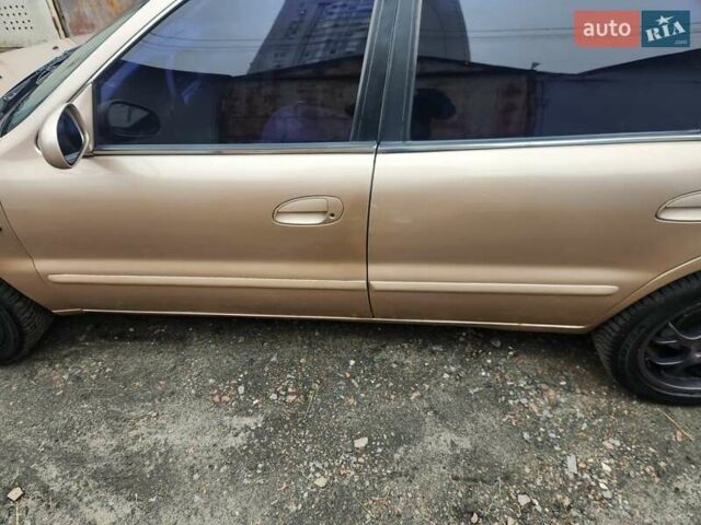 Бежевый Киа Кларус, объемом двигателя 2 л и пробегом 292 тыс. км за 2200 $, фото 6 на Automoto.ua