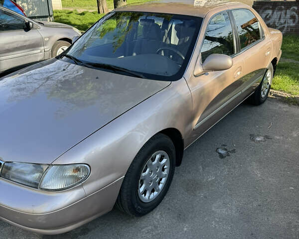 Бежевий Кіа Кларус, об'ємом двигуна 2 л та пробігом 101 тис. км за 3150 $, фото 4 на Automoto.ua