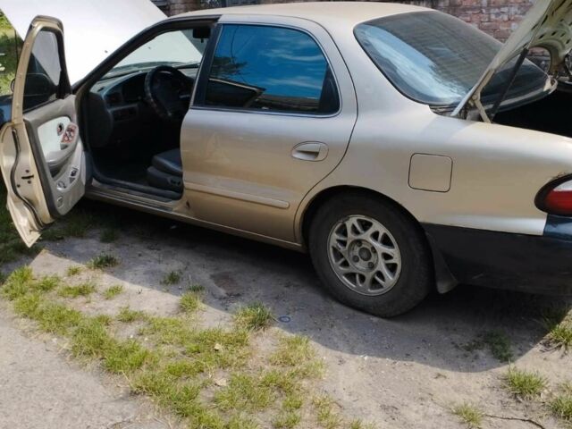 Бежевый Киа Кларус, объемом двигателя 2 л и пробегом 100 тыс. км за 1500 $, фото 1 на Automoto.ua
