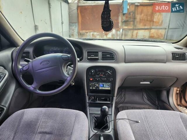 Бежевый Киа Кларус, объемом двигателя 2 л и пробегом 292 тыс. км за 2200 $, фото 12 на Automoto.ua