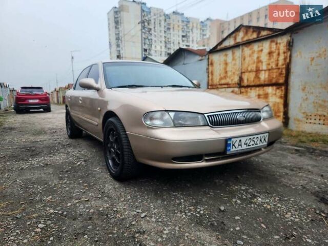 Бежевый Киа Кларус, объемом двигателя 2 л и пробегом 292 тыс. км за 2200 $, фото 2 на Automoto.ua