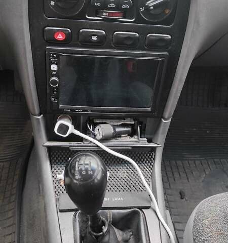 Бежевый Киа Кларус, объемом двигателя 2 л и пробегом 335 тыс. км за 800 $, фото 12 на Automoto.ua