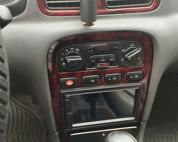 Бежевий Кіа Кларус, об'ємом двигуна 2 л та пробігом 250 тис. км за 1700 $, фото 2 на Automoto.ua