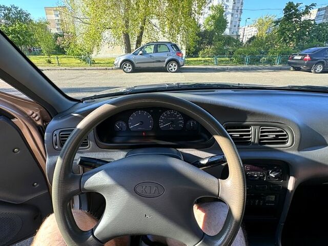 Бежевий Кіа Кларус, об'ємом двигуна 2 л та пробігом 101 тис. км за 3150 $, фото 7 на Automoto.ua