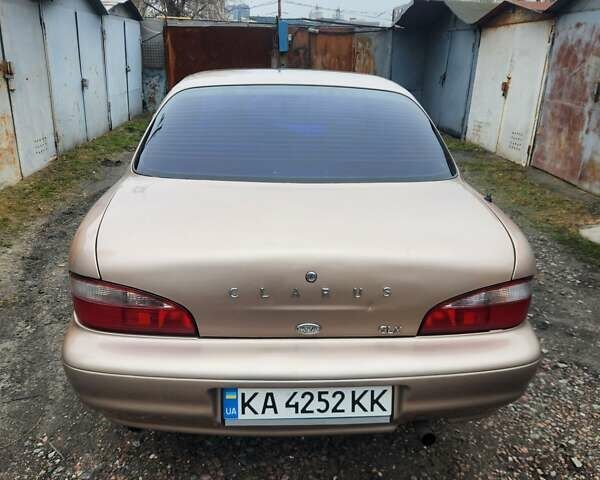 Бежевый Киа Кларус, объемом двигателя 2 л и пробегом 292 тыс. км за 2200 $, фото 4 на Automoto.ua