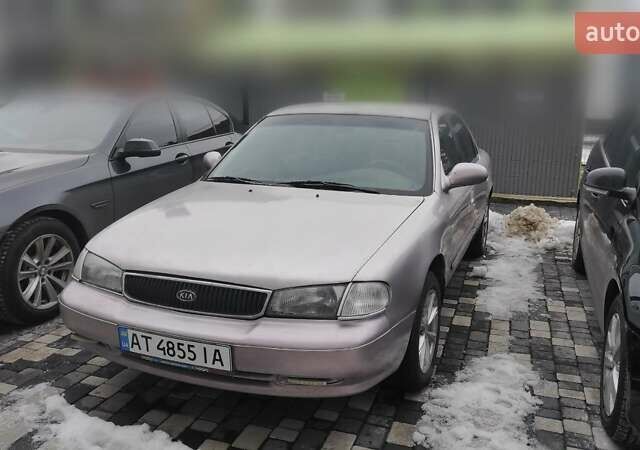 Бежевый Киа Кларус, объемом двигателя 2 л и пробегом 335 тыс. км за 800 $, фото 1 на Automoto.ua