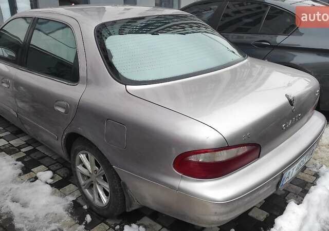 Бежевый Киа Кларус, объемом двигателя 2 л и пробегом 335 тыс. км за 800 $, фото 4 на Automoto.ua