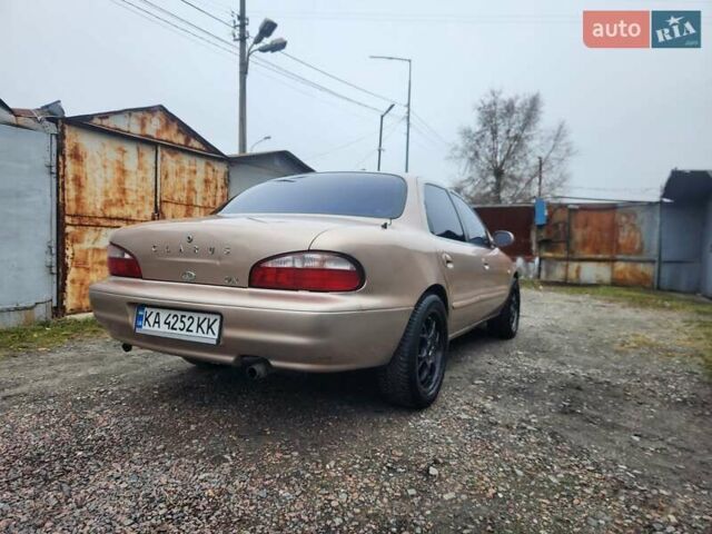 Бежевый Киа Кларус, объемом двигателя 2 л и пробегом 292 тыс. км за 2200 $, фото 5 на Automoto.ua