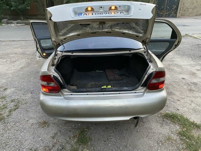 Бежевий Кіа Кларус, об'ємом двигуна 2 л та пробігом 327 тис. км за 2000 $, фото 7 на Automoto.ua