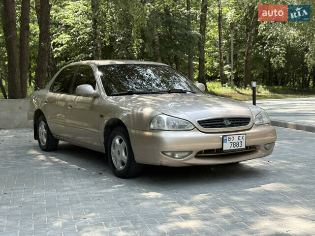 Бежевий Кіа Кларус, об'ємом двигуна 2 л та пробігом 239 тис. км за 2550 $, фото 2 на Automoto.ua