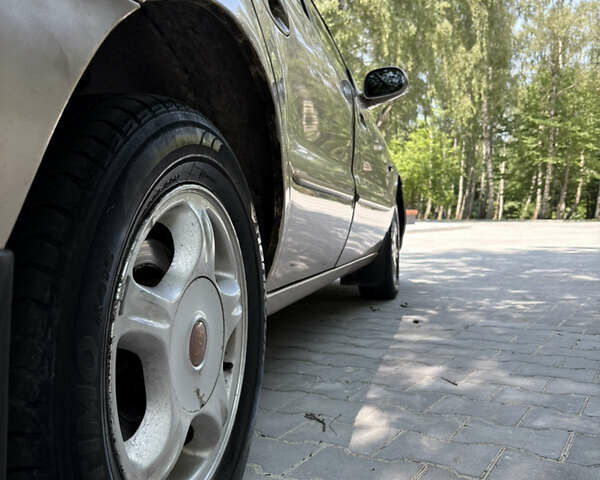 Бежевий Кіа Кларус, об'ємом двигуна 2 л та пробігом 239 тис. км за 2550 $, фото 7 на Automoto.ua