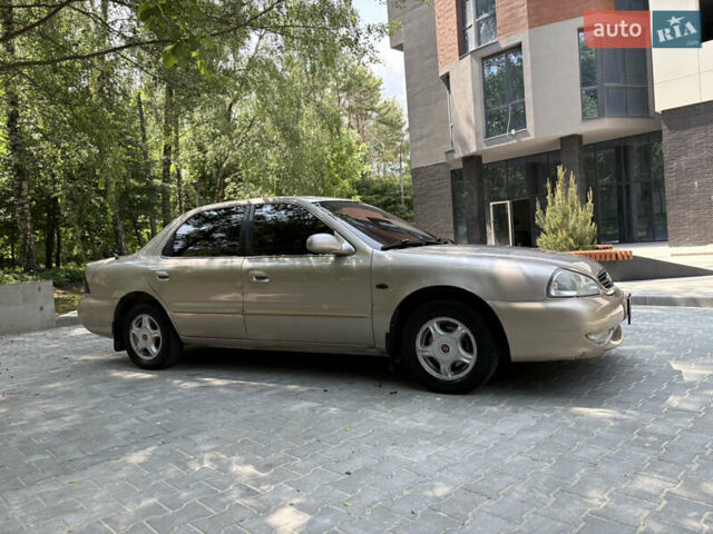 Бежевий Кіа Кларус, об'ємом двигуна 2 л та пробігом 239 тис. км за 2550 $, фото 3 на Automoto.ua