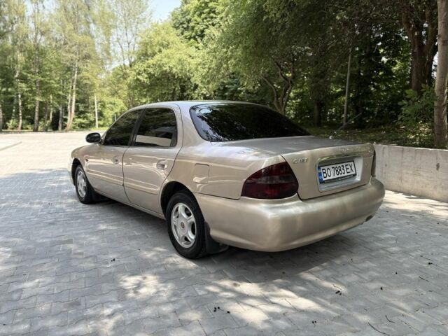 Бежевый Киа Кларус, объемом двигателя 2 л и пробегом 239 тыс. км за 2750 $, фото 6 на Automoto.ua
